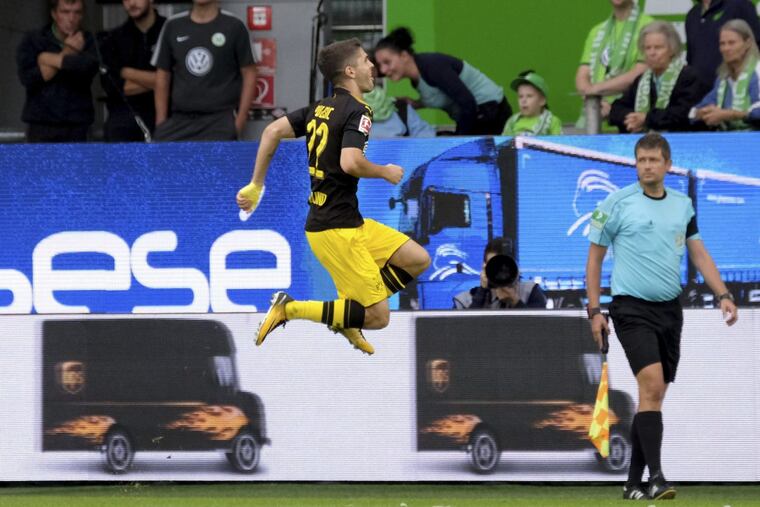 Christian Pulisic scored a goal and helped set up another in Borussia Dortmund’s 3-0 win at Hamburg SV.