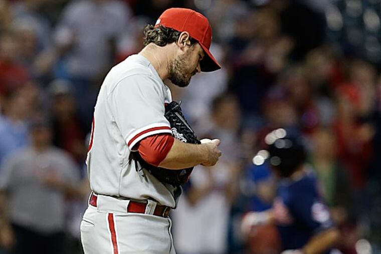 Phillies relief pitcher Chad Durbin waits for the Indians' Ryan Raburn to run the bases after Raburn hit a two-run home run in the fifth inning. (Tony Dejak/AP)