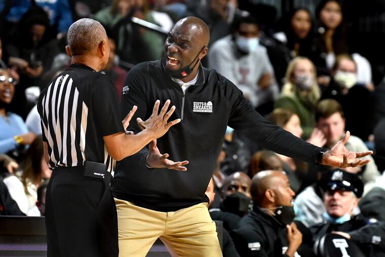 Temple head coach Aaron McKie converses with the officials during during the first half at the Liacouras Center Jan. 25, 2022.