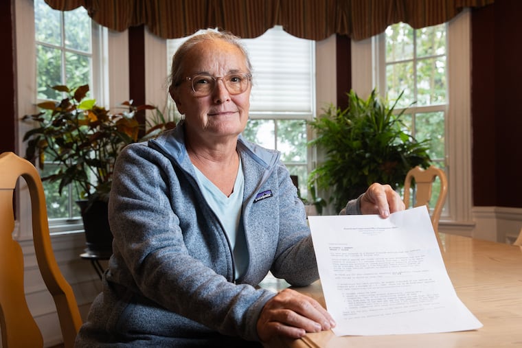 A Bala Cynwyd couple received a fraudulent letter from the Pennsylvania Congressional Office of Immigration Affairs this week informing her that she'd been selected as a "wayward steward" to house five refugees. The office does not exist, nor does the program. Elizabeth Bennett holds the letter on Sept. 27, 2024.