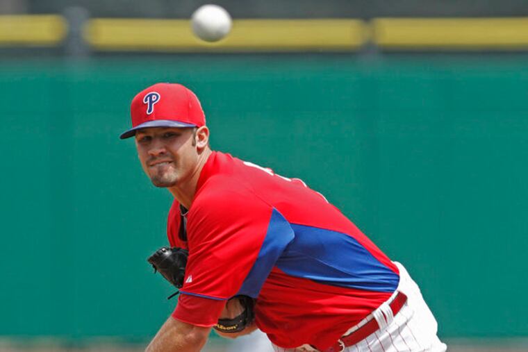 Phillies starting pitcher Adam Morgan pitched well in his outing against the Braves. Philadephia Phillies vs Atlanta Braves at Bright House field. Game Action 03/22/2013 ( MICHAEL BRYANT / Staff Photographer )