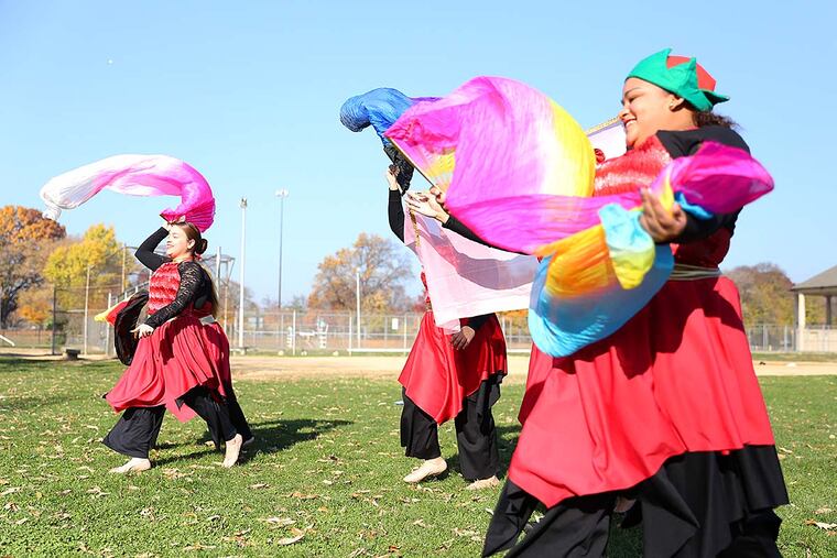The Dreamchasers dance group from Iglesias Manto de Gloria church, perform during the Seasonal Unity Day festival at Hunting Park Recreation Center on November 19, 2016. ( TONI FARINA / Staff Photographer )