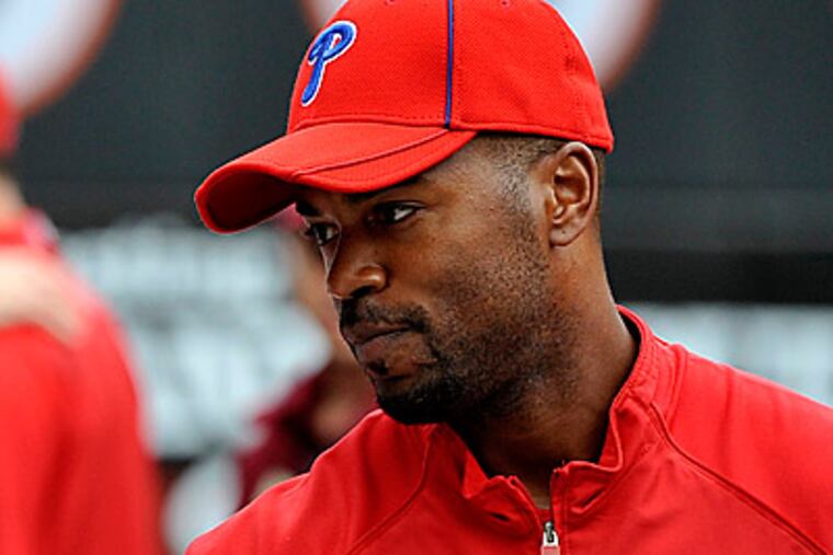 Jimmy Rollins has been out since last Wednesday after injuring his hamstring. (AP Photo/Kathy Kmonicek)