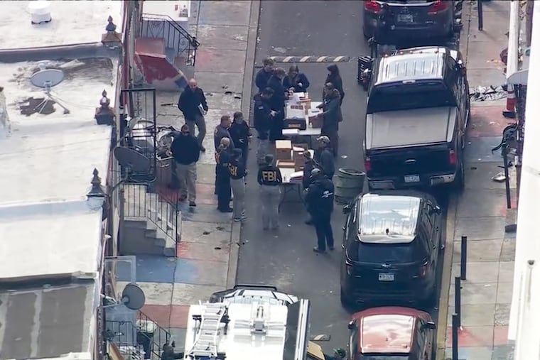 FBI agents raid a suspected drug operation in the Kensington section of Philadelphia in October. The city is safer than it's been in a generation, writes Wayne A. Jacobs, the special agent in charge of the FBI's local field office.