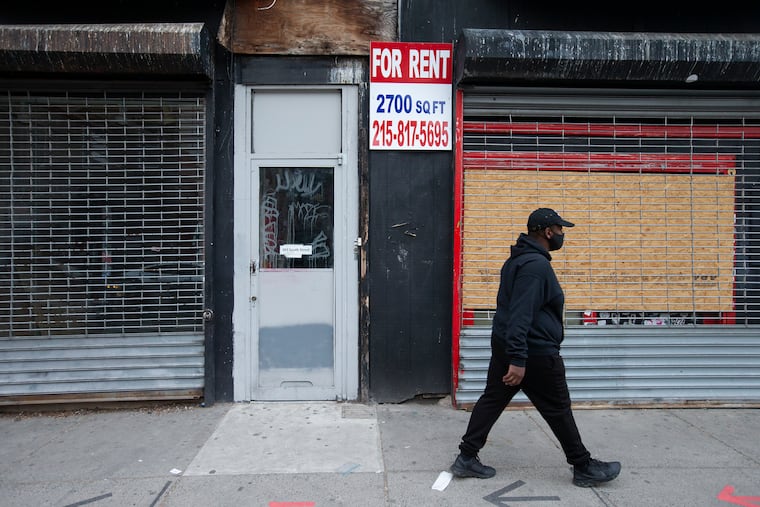 Vacant storefronts on South Street in Philadelphia on March 6, 2021.
