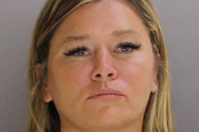 Former Kennett Township Manager Lisa Moore, 46, is charged with multiple counts of theft by unlawful taking, forgery, and related offenses.