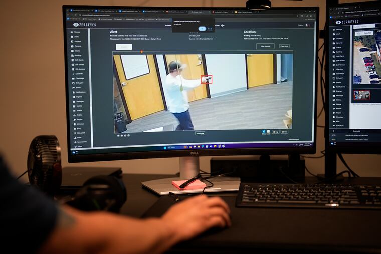ZeroEyes analyst Mario Hernandez demonstrates the use of artificial intelligence with surveillance cameras to identify visible guns at the company's operations center, Friday, May 10, 2024, in Conshohocken, Pa. (AP Photo/Matt Slocum)
