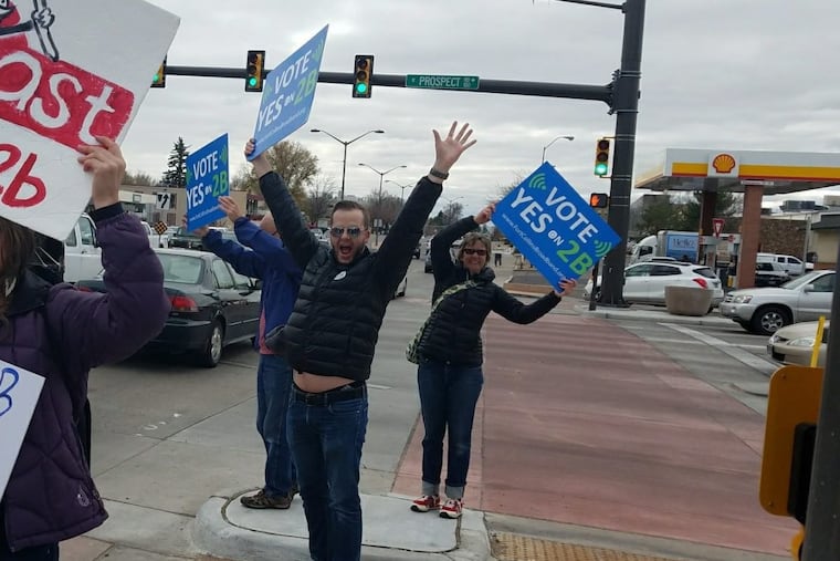 Fort Collins, Colo., supporters of ballot issue 2B that will enable the city to build its own broadband network to compete with Comcast and CenturyLink. The issue passed on Tuesday, 57 percent to 43 percent.