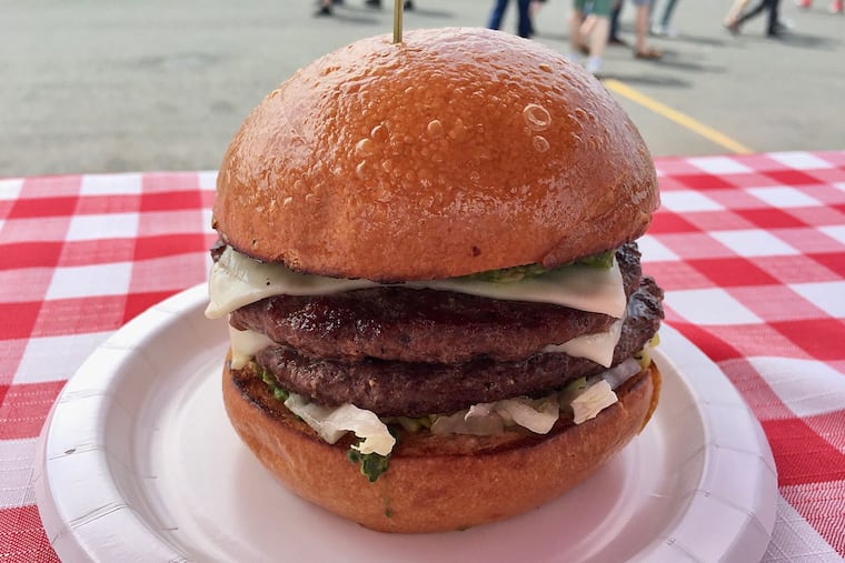A double-patty competitor in 2017’s Burger Brawl at Xfinity Live.