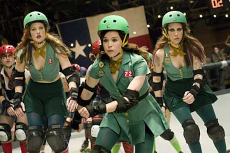 Drew Barrymore, Ellen Page and Kristen Wiig star in Barrymore’s paean to
nonconformists, "Whip It."