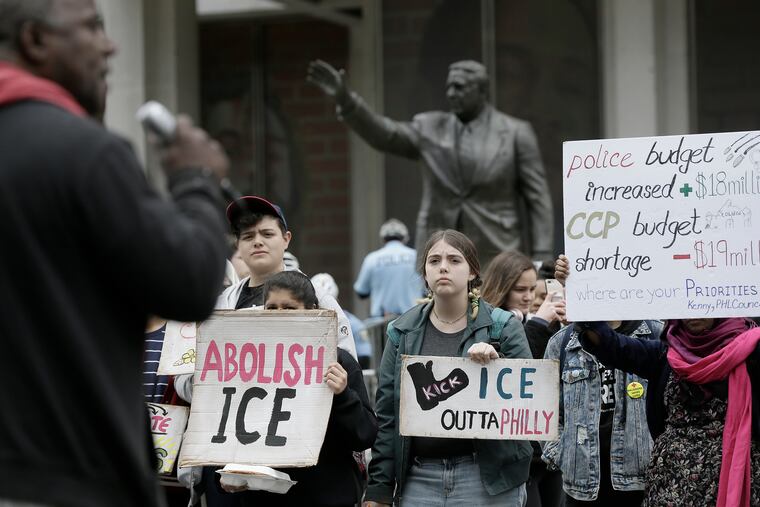 Michael Wilson of Philadelphia speaks in front of the Frank Rizzo statue during the "End ICE Contracts" May Day solidarity rally in Philadelphia. Wilson is part of the Workers World Party and serves on the steering committee for the Real Justice Coalition.