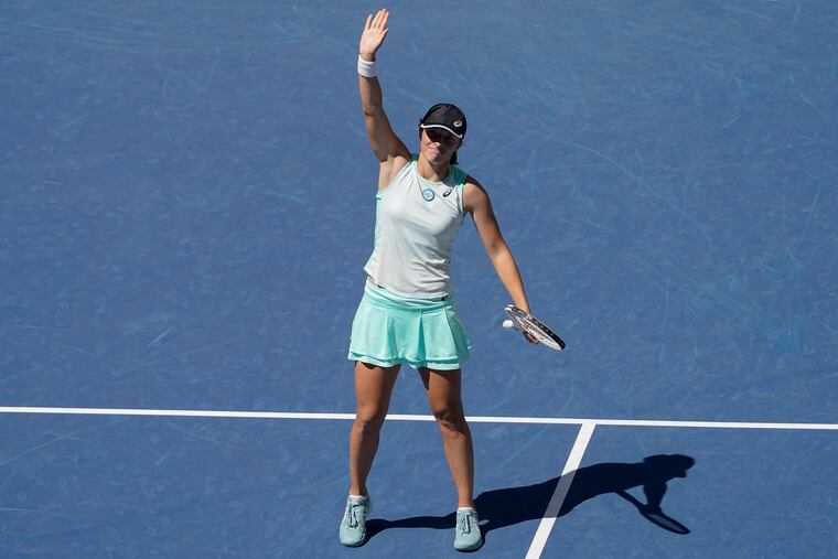 Iga Swiatek, of Poland, reacts after defeating Sloane Stephens, of the United States, during the second round of the U.S. Open tennis championships on Thursday.