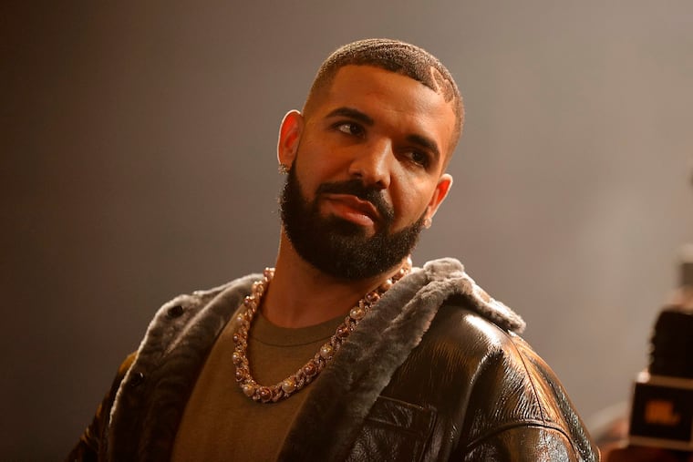 Drake speaks onstage during his "Till Death Do Us Part" rap battle on Oct. 30, 2021, in Long Beach, California. On Monday, the Canadian rap star performed at the Wells Fargo Center on his "It's All A Blur" tour. (Amy Sussman/Getty Images/TNS)