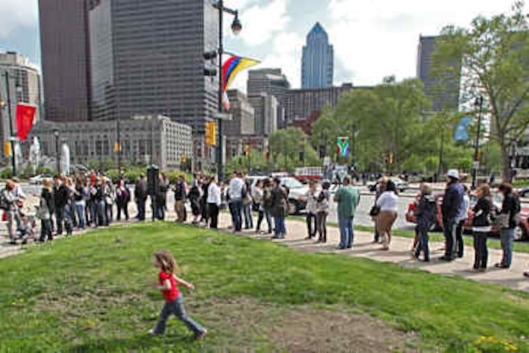 Chelsea Handler fans form a long line as they await her arrival at the Vine Street signing tent. Among the first to get there were Barbara Roysdon of Franklinville and her sons, Paul, 17, and Brett, 13.
