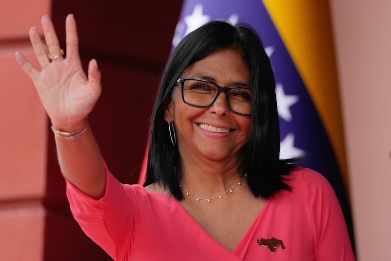 Venezuela's acting President Delcy Rodriguez waves as she waits for Colombian President Gustavo Petro at Miraflores Palace in Caracas on April 24.
