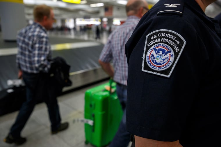 Fille photo of a U.S. Customs and Border Protection officer at John F. Kennedy International Airport in 2014.