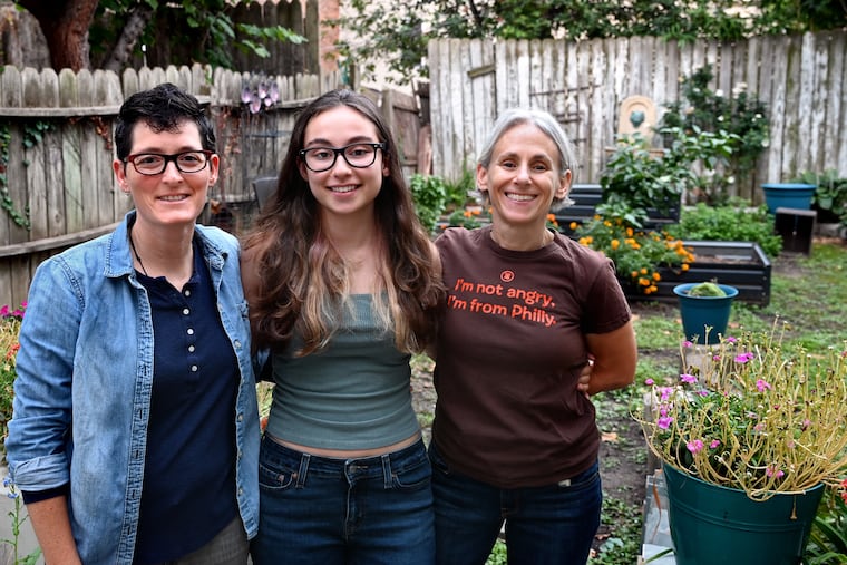 (From left) Marion Leary, Harper Leary, 16, and Lara Kelly pose at home on Sept. 28, 2021.