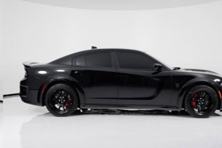 A stock image of a high-performance black Dodge Charger, the same model of car police believe was used in a fatal hit-and-run on Monday morning which left 29-year-old Talyia Bernice Nesmith dead.