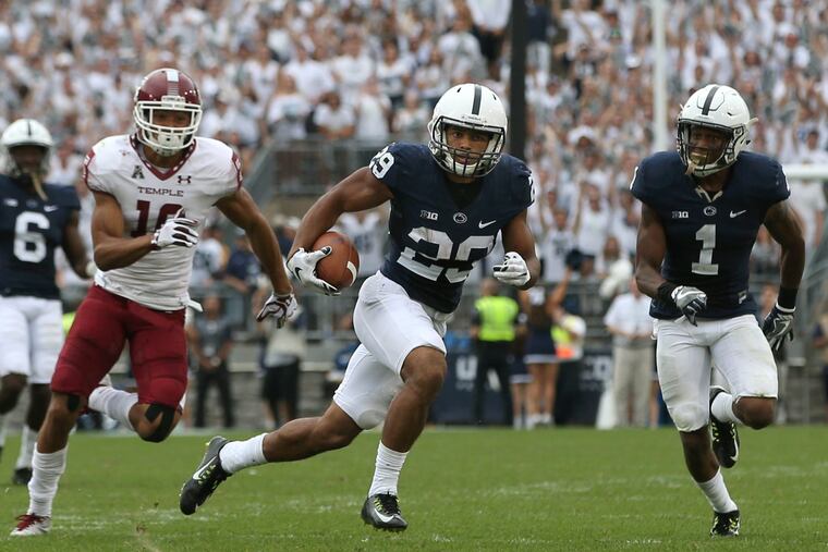 John Reid (center) hasn't played since the end of the 2016 season, but he says he's better than ever.