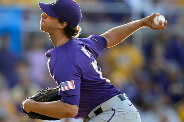 Aaron Nola (10) pitches in the first inning of an NCAA college baseball regional tournament game against Houston in Baton Rouge, La., Saturday, May 31, 2014. (Gerald Herbert/AP)
