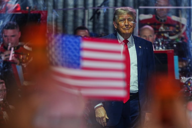 President Donald Trump stands on stage after speaking at the opening of the Great American State Fair on the National Mall, Wednesday, June 24, 2026, in Washington. (AP Photo/Julia Demaree Nikhinson)