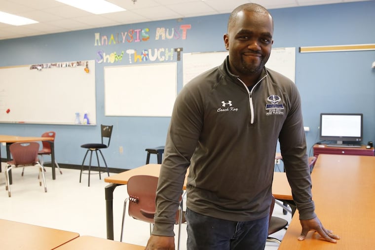 Matthew Kay stands in his classroom at the Science Leadership Academy in Center City.