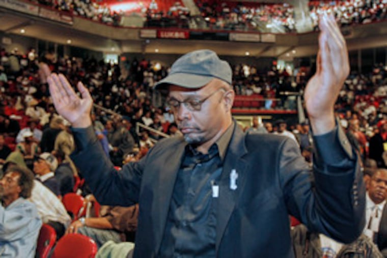Praying for an end to violence in Philadelphia, Carmen Fields was among those who stood up to become volunteers at the Liacouras Center in North Philadelphia.