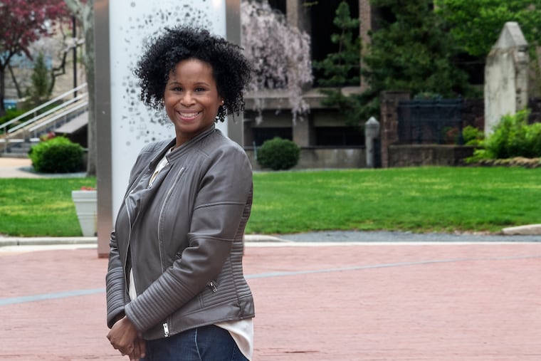 Nyeema Watson, vice chancellor of diversity, inclusion, and civic engagement at Rutgers-Camden, at the main entrance to the campus. Watson was born and raised and continues to live in Camden.