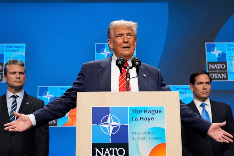 FILE - President Donald Trump speaks during a media conference at the end of the NATO summit as Secretary of State Marco Rubio, right, and Defense Secretary Pete Hegseth listen in The Hague, Netherlands, June 25, 2025.