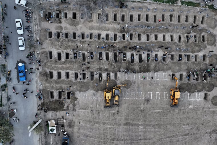 FILE.- This picture, released by the Iranian government's foreign media department and distributed by the AP without changes, shows graves being prepared for the victims, mostly children, of a strike Feb. 28 on a primary school in Minab, Iran, Monday, March 2, 2026.
