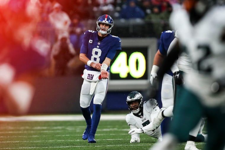 Giants quarterback Daniel Jones looks downfield during a loss to the Eagles on Dec. 11 in East Rutherford, N.J.