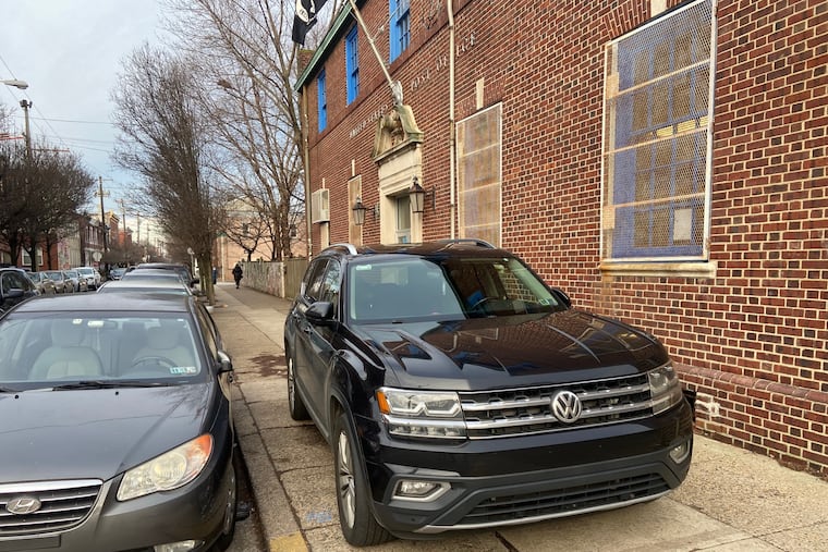 Vehicle parked on the sidewalk on the 900 block of Dickinson Street in January, blocking path to the post office.