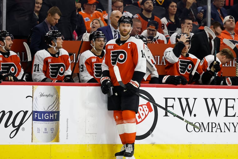 Flyers captain Sean Couturier near the Flyers bench during a break against the Nashville Predators on Thursday.