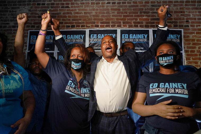 State Rep. Ed Gainey celebrates with wife Michelle (left) after winning the Democratic primary for Pittsburgh mayor on Tuesday.
