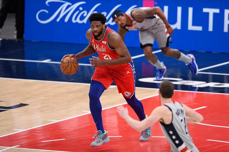 Joel Embiid had 23 points before suffering a deep bone bruise in his left knee in the third quarter Friday night against the Washington Wizards.