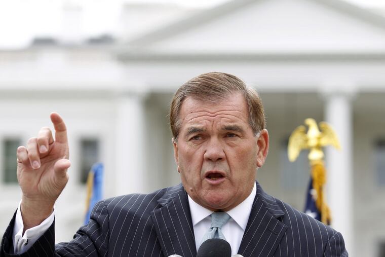 Former Secretary of Homeland Security Tom Ridge speaks to a crowd of hundreds protesting in front of the White House in 2011. (AP Photo/Jose Luis Magana)