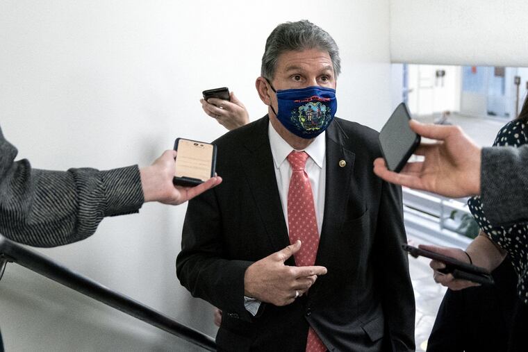 U.S. Sen. Joe Manchin III (D., W. Va.) speaking to reporters in a Senate building in March.