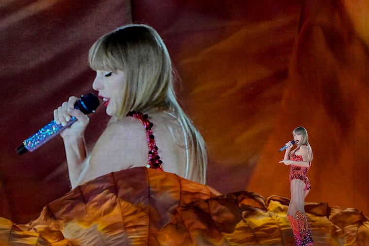 Taylor Swift performs in Paris during her Eras Tour concert on May 9, 2024. After her album announcement, companies almost immediately rolled out orange-themed memes.