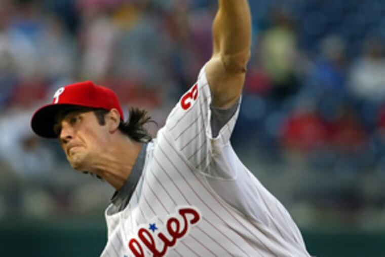 Phils starter Cole Hamels threw seven strong innings to pick up his fifth win.
