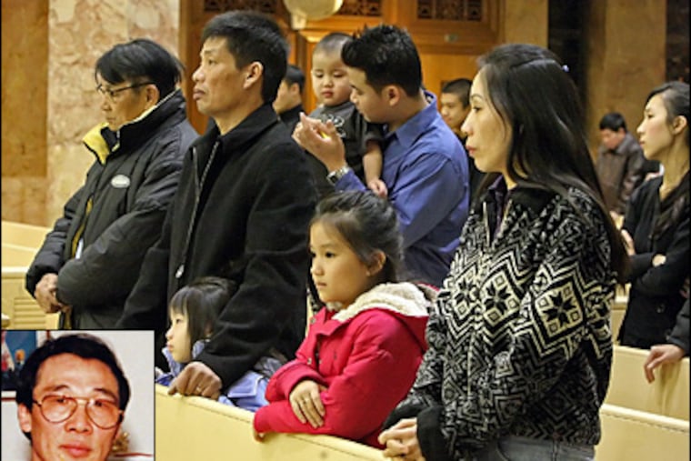 Family members attend mass for slain home invasion victim Hoa Pham at St. Alice's Church in Upper Darby Pa. Pham was brutally murdered in the attack but his wife survived. ( Steven M. Falk / Staff Photographer )