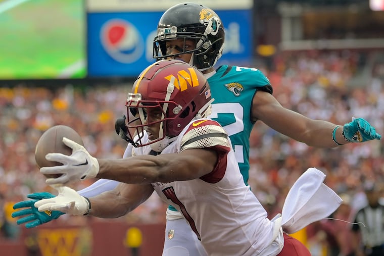 Rookie wide receiver Jahan Dotson had two touchdown catches, including the go-ahead score with less than two minutes left in Washington's victory over Jacksonville.