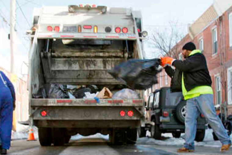 Philadelphia sent a $150 bill for trash collection to 55,000 businesses and apartment buildings last month even though many pay for private pickup. (Elizabeth Robertson / Staff Photographer)