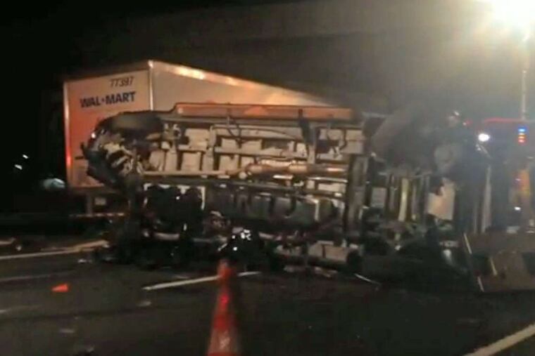 The limousine bus carrying Tracy Morgan lies on its side on the New Jersey Turnpike. The driver of the Mercedes limo bus said he heard Morgan screaming for help after the Saturday morning crash but was unable to reach him. Comedian James "Jimmy Mack" McNair was killed in the accident.
