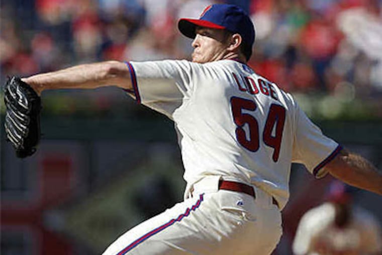 Brad Lidge isn't the first reliever to run hot and cold from one year to the next. But the cold closer is the only one Phillies fans worry about. (David Maialetti / Staff Photographer)
