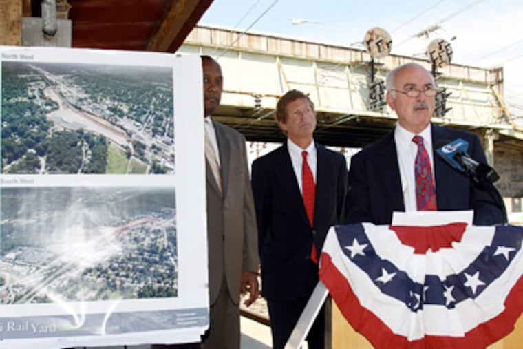 State Rep. Paul J. Drucker talks about the $1 million grant for a solar-power field in Paoli. With him were State Rep. Dwight Evans (left) and Peter Monaghan of Strategic Realty Investments. (Jonathan Yu / Staff Photographer)