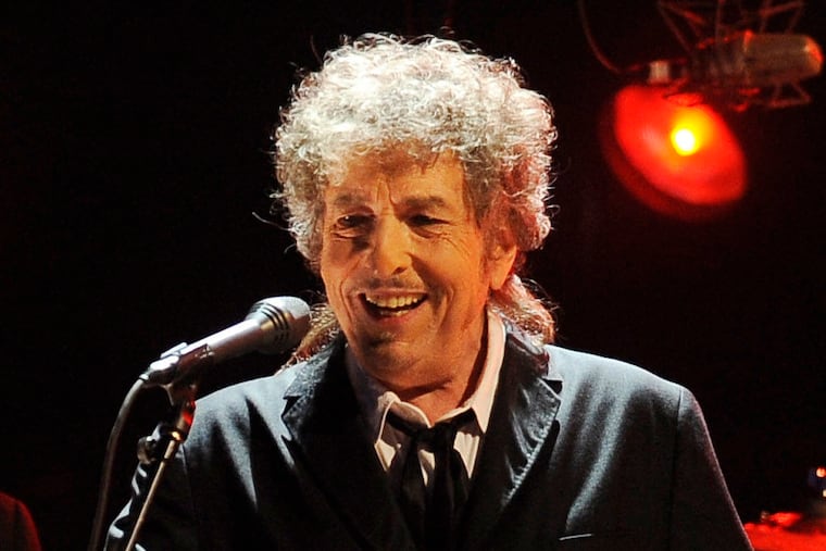 Bob Dylan performing in Los Angeles in 2012. Dylan brought his "Long Hot Summer Tour" to the TD Pavilion at the Highmark Mann on Tuesday. Photographers were not permitted at the show. (AP Photo/Chris Pizzello, File)