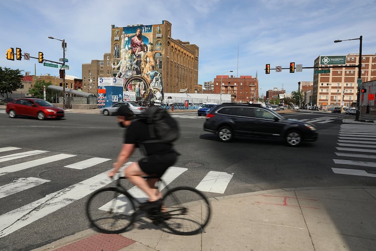 Traffic flows through the intersection of Broad and Spring Garden Streets in Philadelphia on Thursday, May 6, 2021.