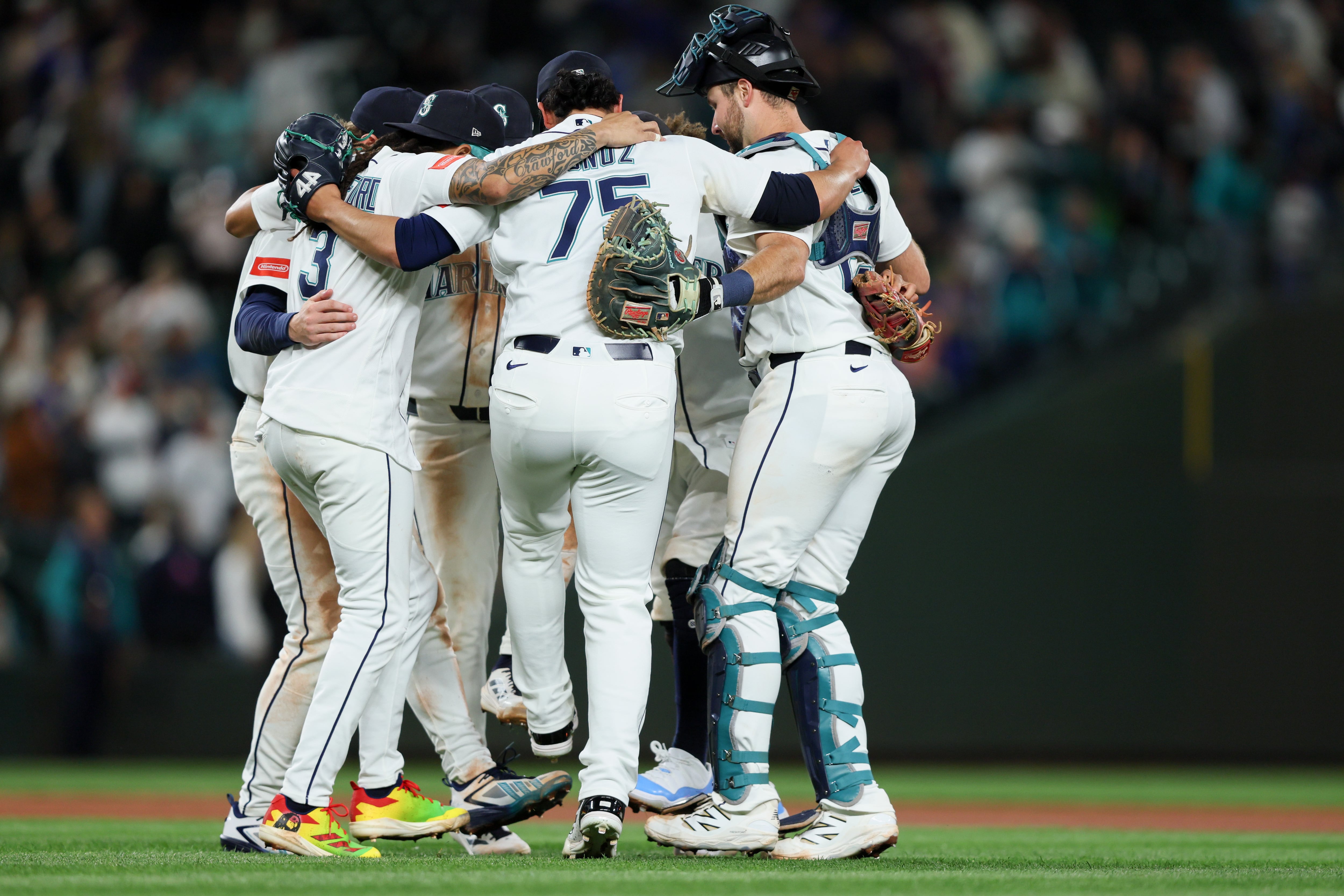 Mariners have big sixth inning to back Woo in an 8-3 victory over the Angels