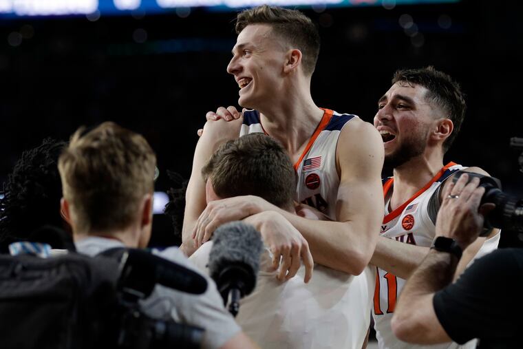Virginia's Kyle Guy celebrates after defeating Auburn 63-62 in the semifinals of the Final Four NCAA college basketball tournament, Saturday, April 6, 2019, in Minneapolis. (AP Photo/David J. Phillip)