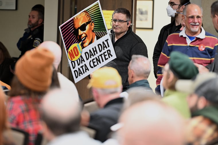 People opposed to a data center proposal at the former Pennhurst state hospital grounds attend an East Vincent Township supervisors meeting, Dec. 17, 2025, in Spring City, Pa. The board voted on May 21, 2026, to deny the proposal for the project, but the developer plans to appeal.
